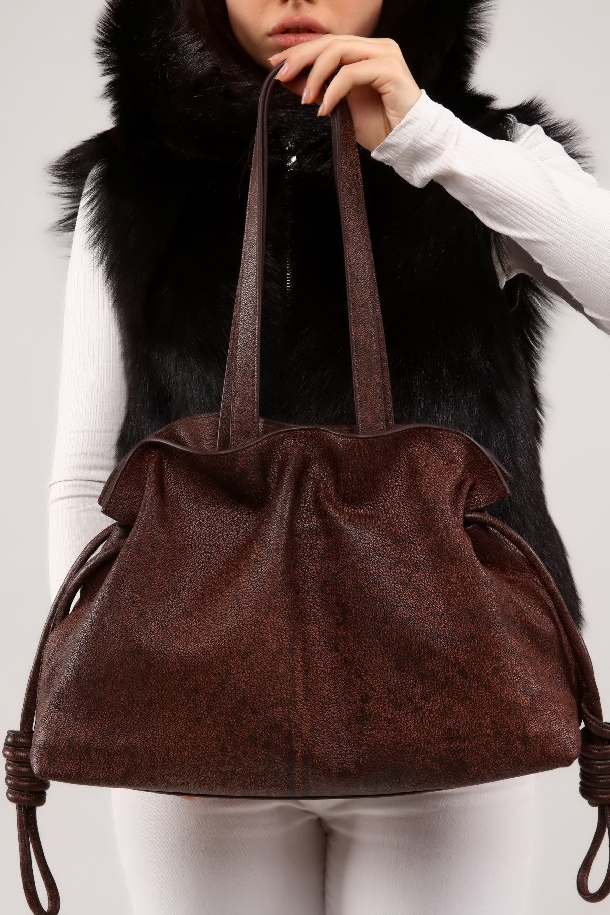 Schwarze Ledertasche mit Leopardenmuster für Damen